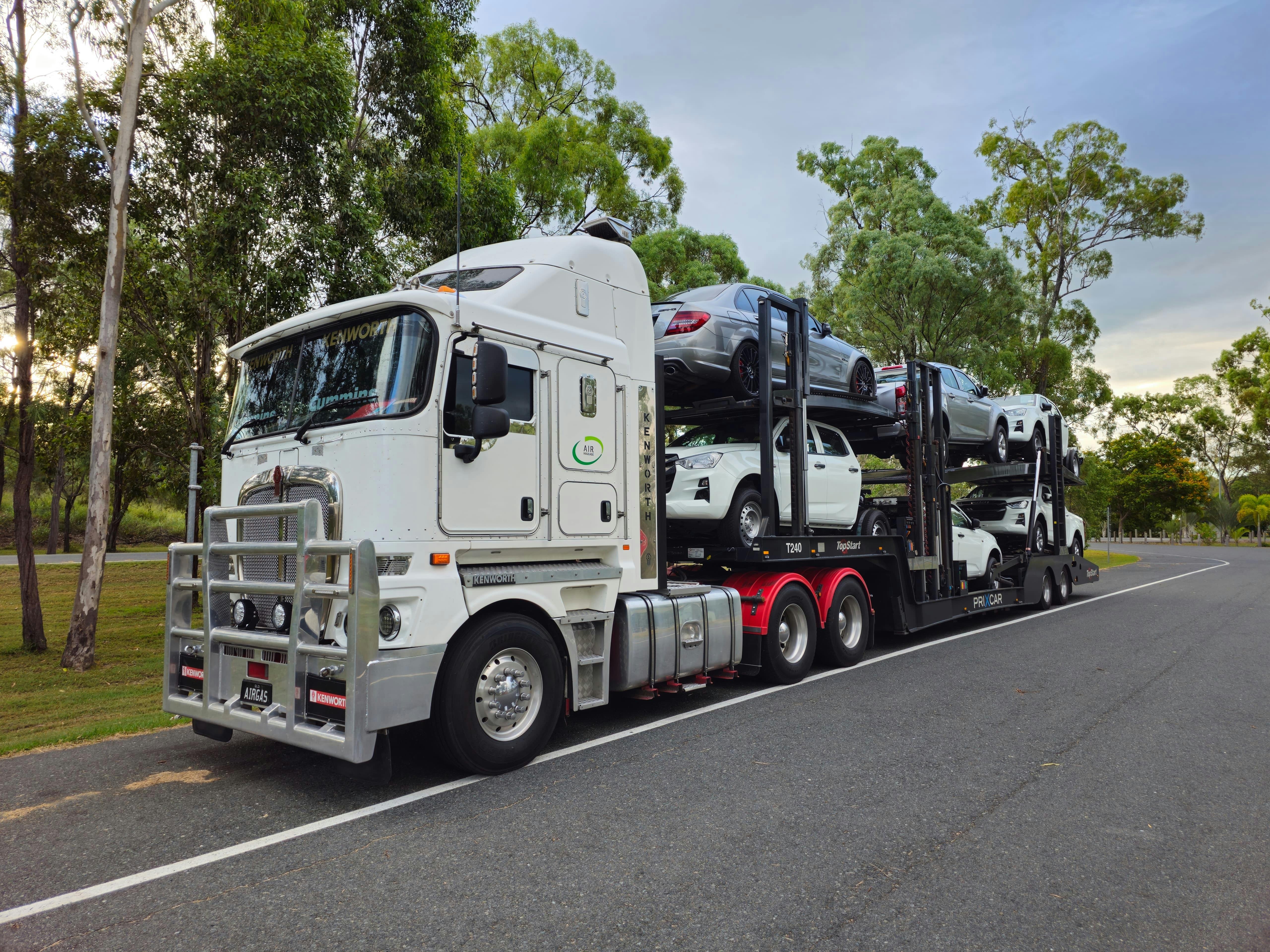 Vehicle pickup and inland transport coordination